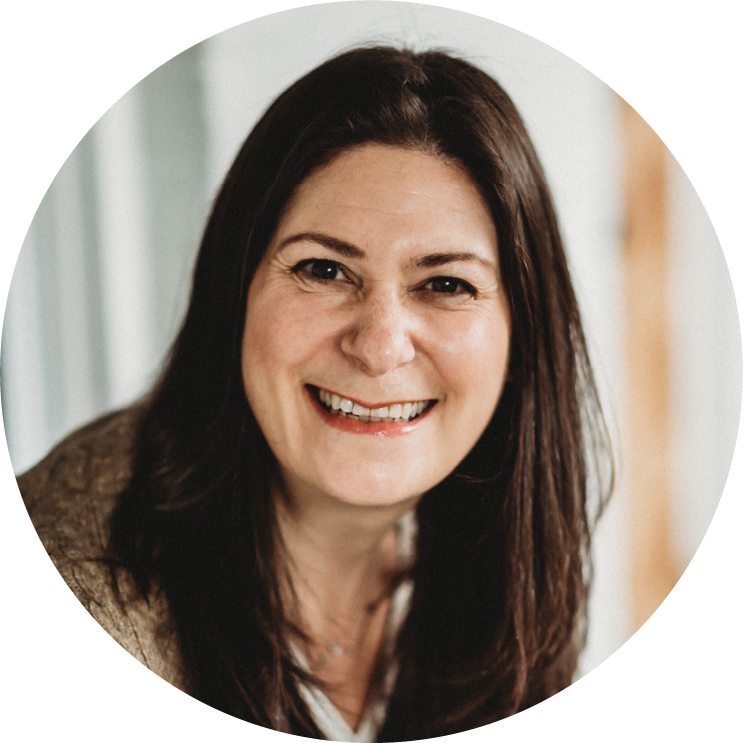 Headshot of Zoe Dunn– President and CEO.